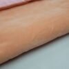 beige-kids-sleeping-bag-lining Pink outer fabric folded over beige sleeping bag lining