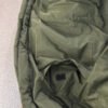 olive-green-sleeping-bag-detail Olive green sleeping bag with hook-and-loop closure detail