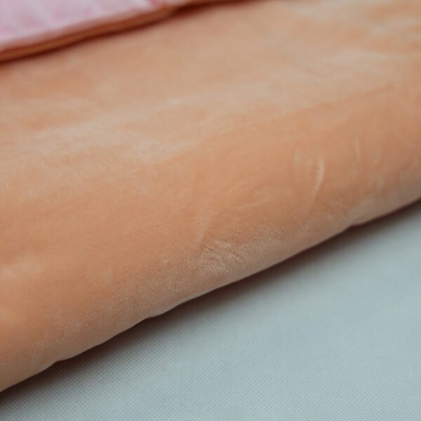 pink-kids-sleeping-bag-fabric-detail Texture detail of beige sleeping bag lining