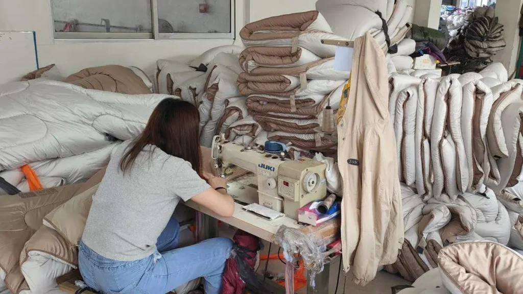 Sleeping bag sewing and manufacturing process