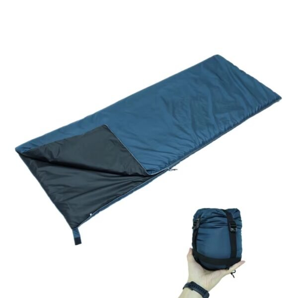 Blue envelope sleeping bag showing its open design and compact storage